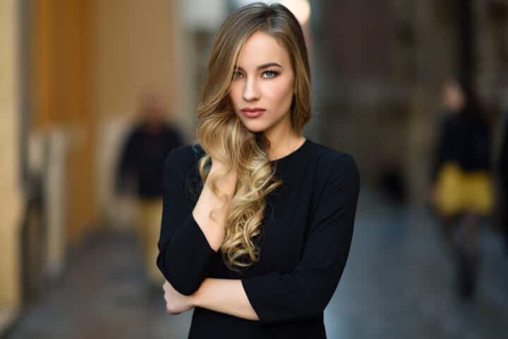 Beautiful blonde russian woman in urban background
