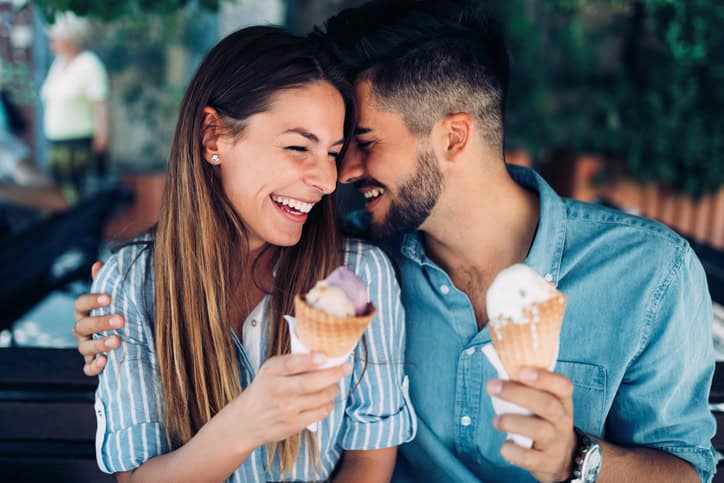 young couple eating icecream