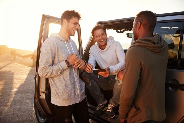 group of men laughing and smiling