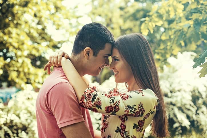 Young couple enjoying spring in the park.