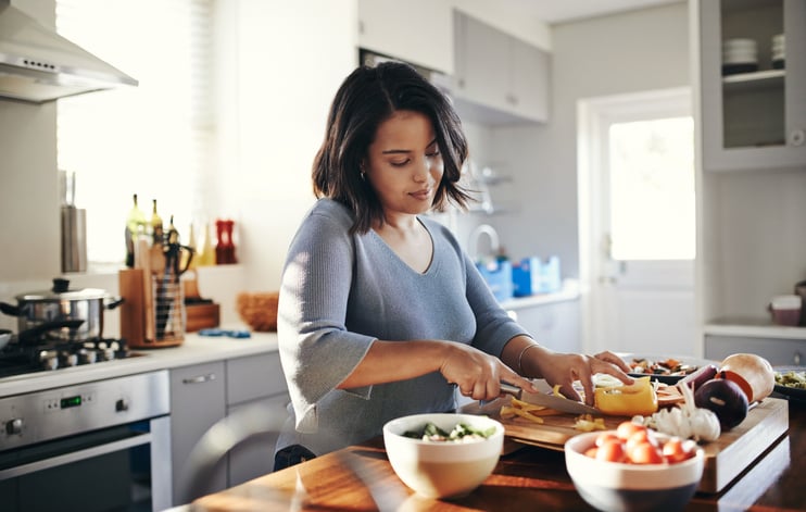 Woman making a healthy meal.