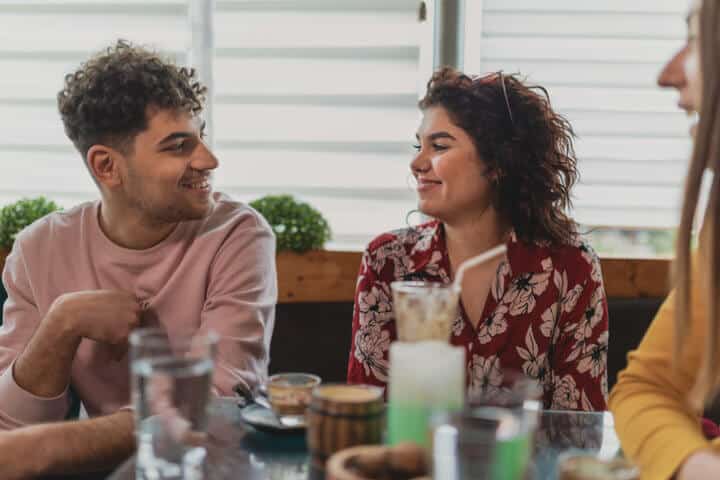 couple having drinks at a bar