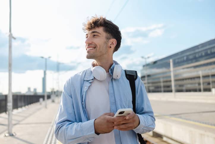 man texting while on the move