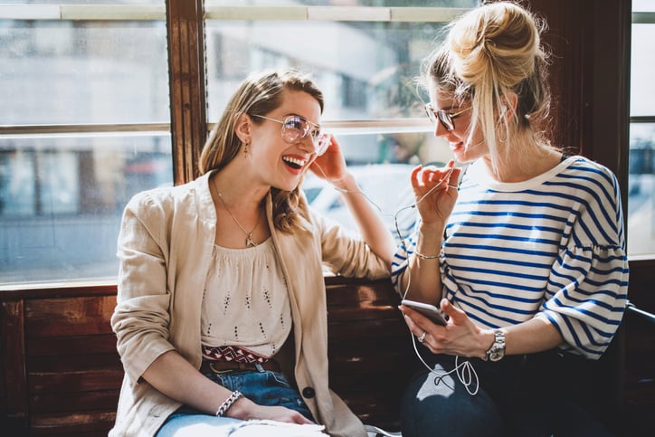 Two women chatting.