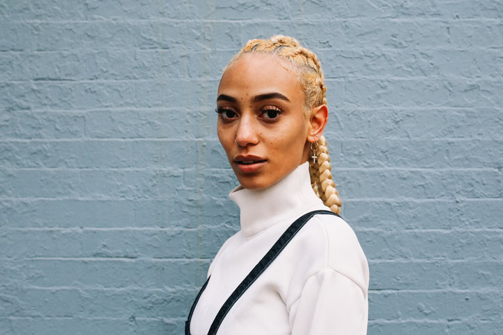 bi-racial woman with braids