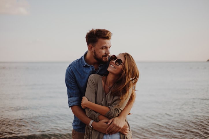 modern couple on the beach