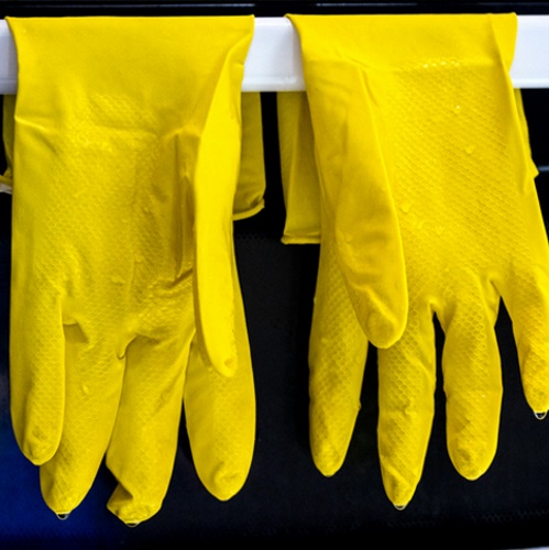 A pair of yellow rubber gloves.