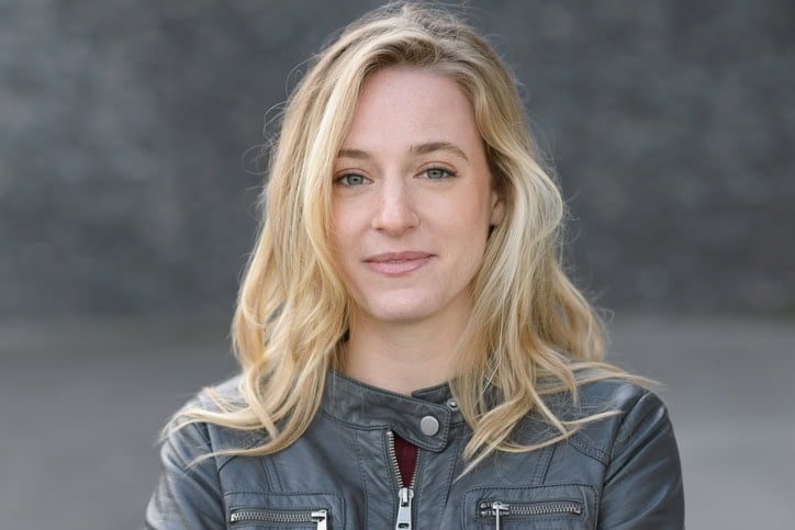 blonde woman facing camera