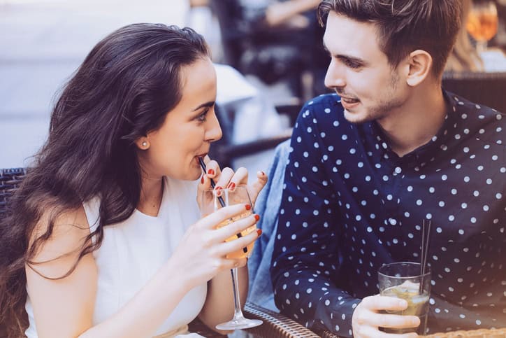 couple drinking coffee outside