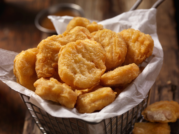 Chicken nuggets in a basket.