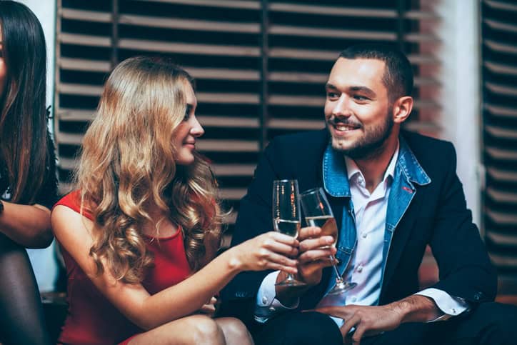 young couple drinking together