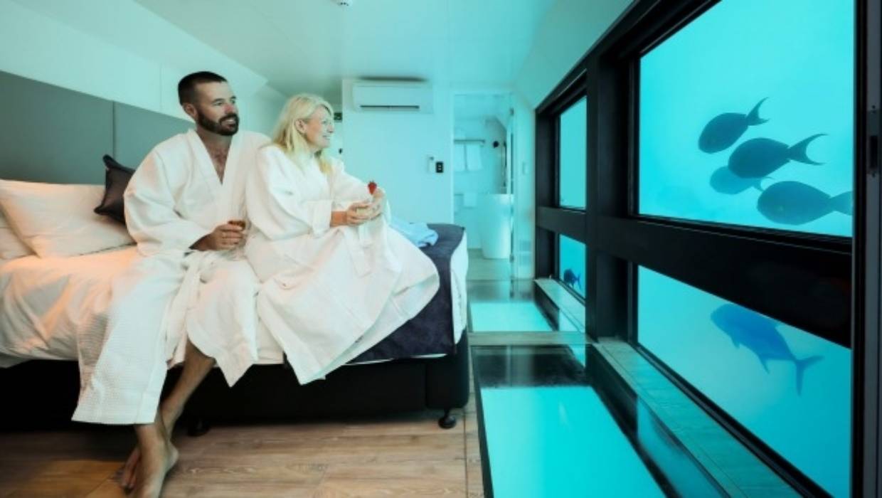 Couple in a hotel room.