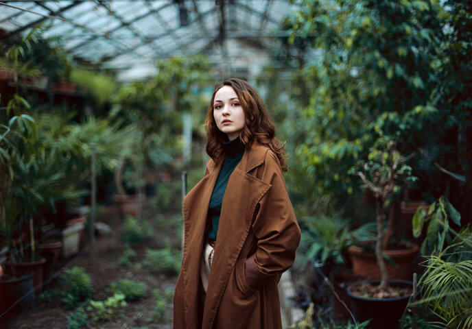 woman in brown long coat