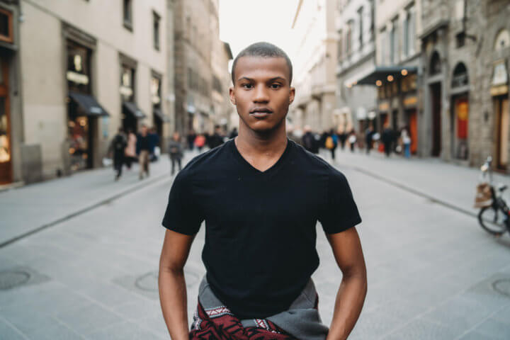 Portrait of a young adult man in the city