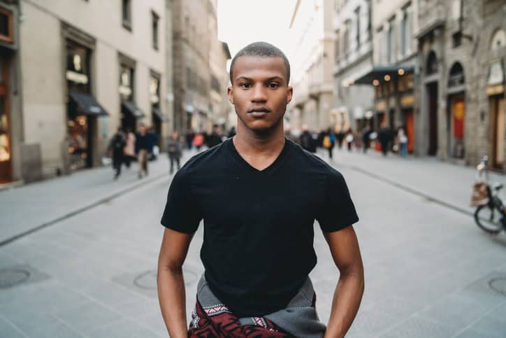 Portrait of a young adult man in the city