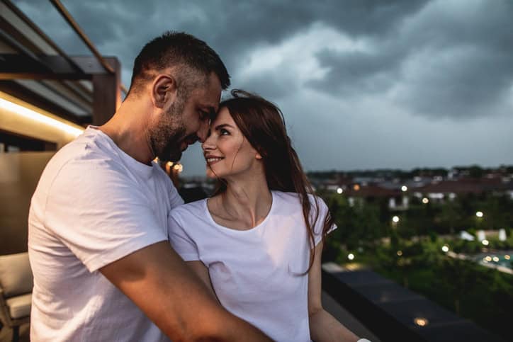 young couple staring into each other's eyes