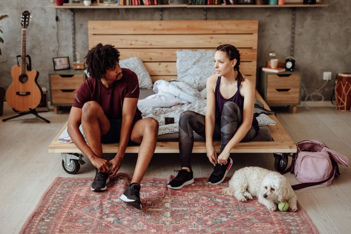 couple hanging out with their dog