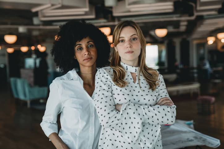 two women looking serious