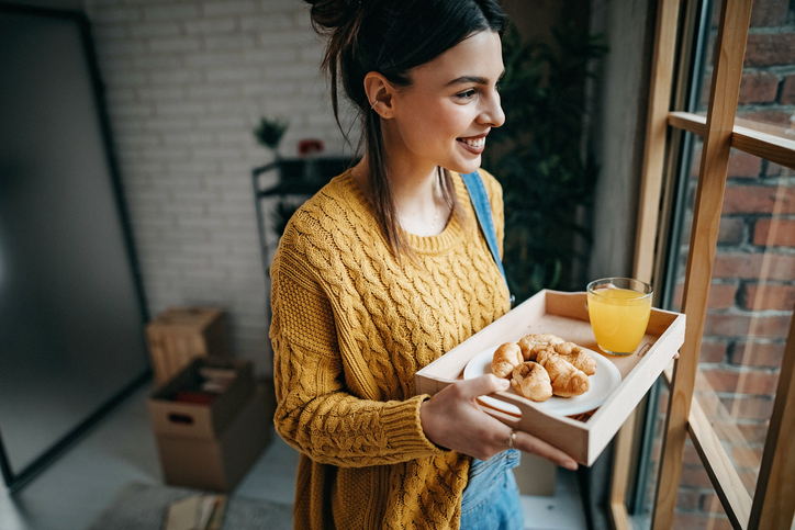woman with food on a tray