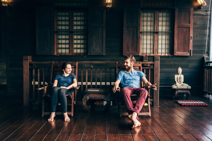 couple sitting in chairs on a date