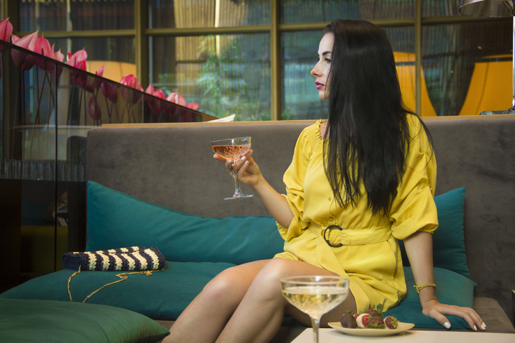 Woman at a hotel bar.