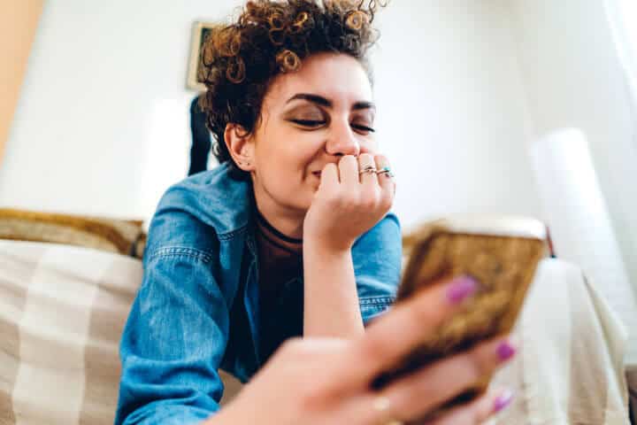 woman holding mobile phone