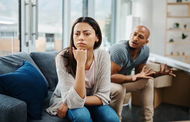 unhappy black couple fighting
