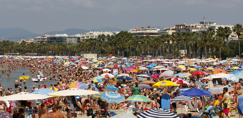People relaxing and having fun on the beach.