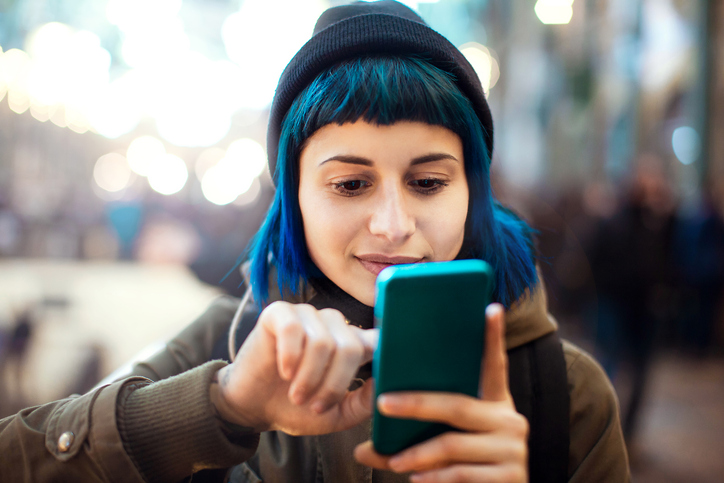 woman swiping on dating app