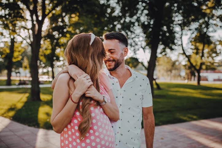 couple walking in the park in love