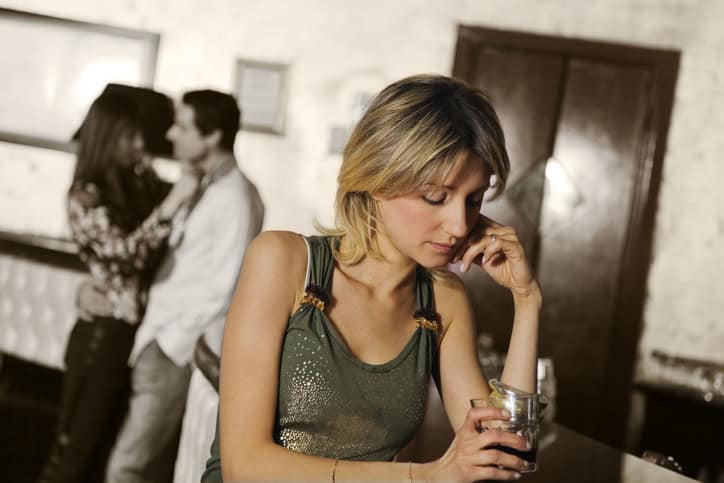 woman upset at man cheating
