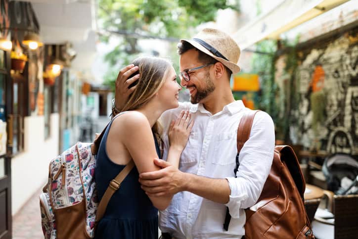 man and woman in the city enjoying themselves