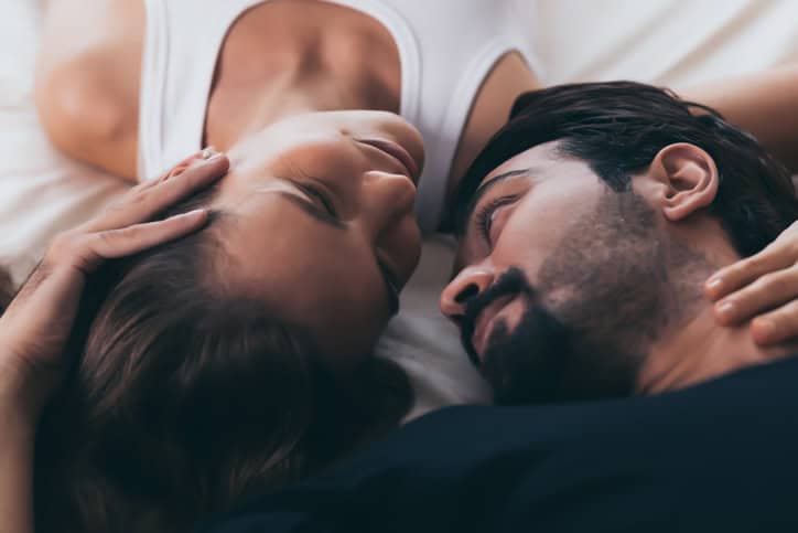 couple laying in bed