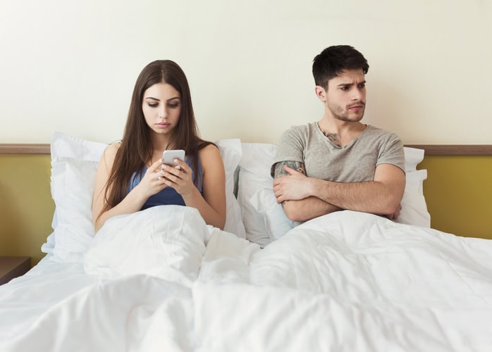 couple in bed bored