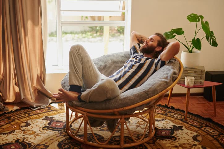 Man relaxing at home.
