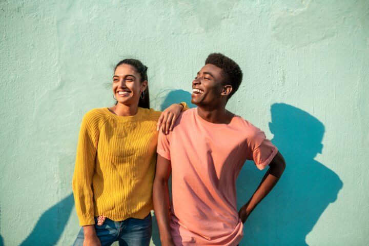 mixed race couple laughing