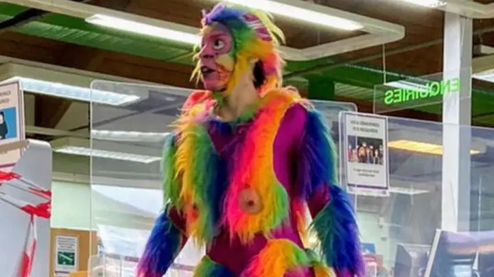Man dressed in a bright costume.