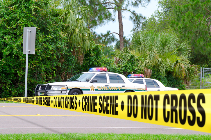 Police cordon tape at a crime scene.