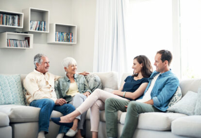 family of four sitting together