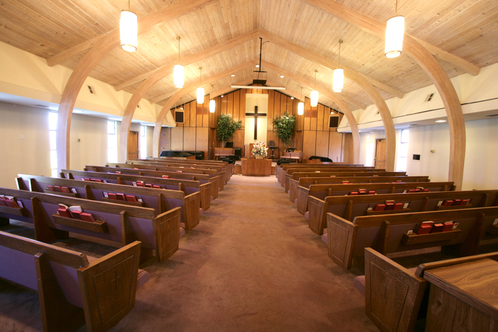 Inside a church, pray.