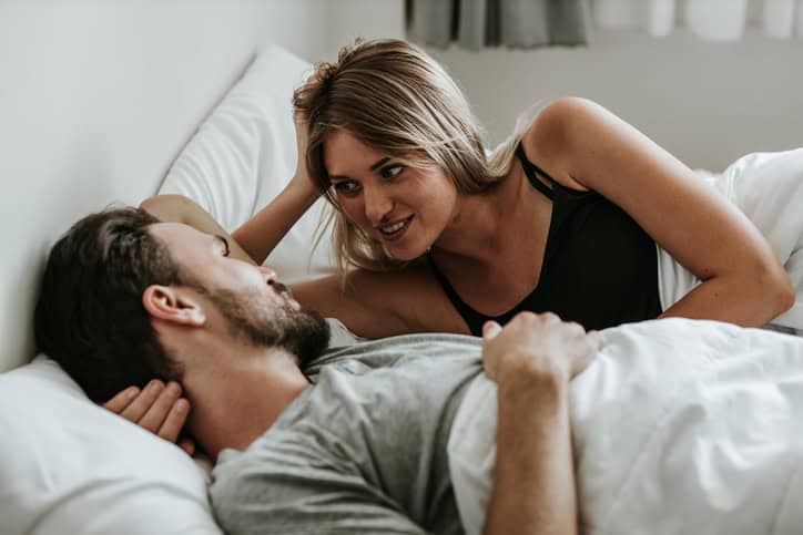 couple laying in bed