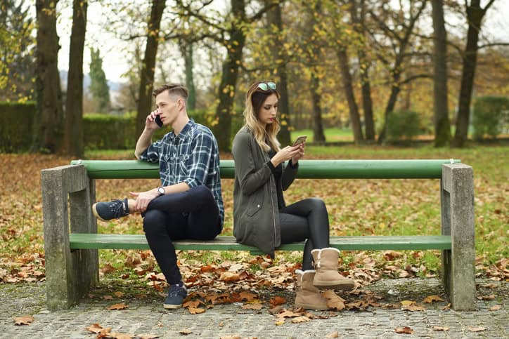 young couple having difficulties in the park