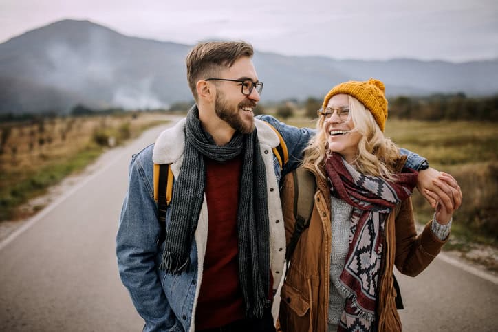 couple with winter clothes outside