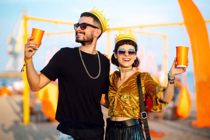 young couple fairground smiling