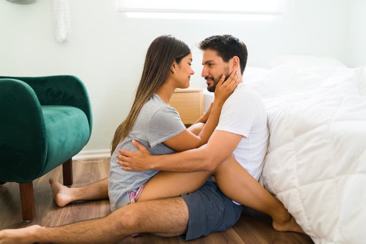 couple sitting on the floor embracing
