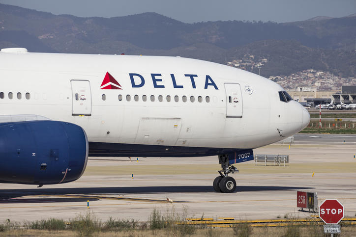 A Delta airplane at the airport.