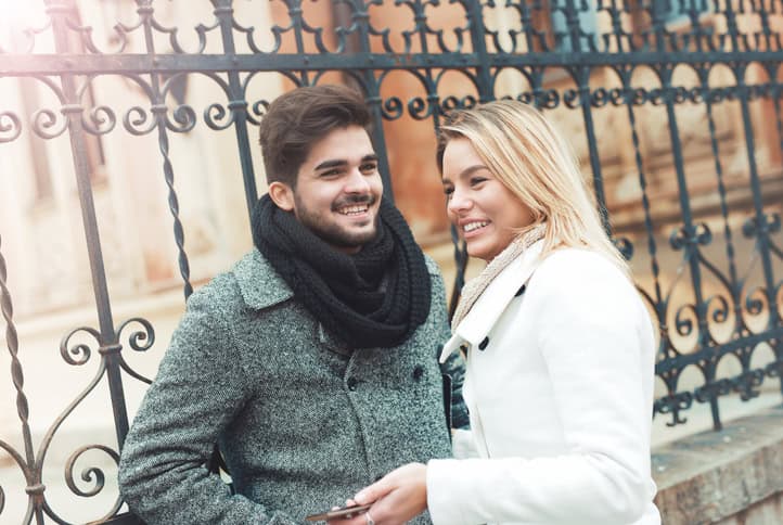 couple outside near railings