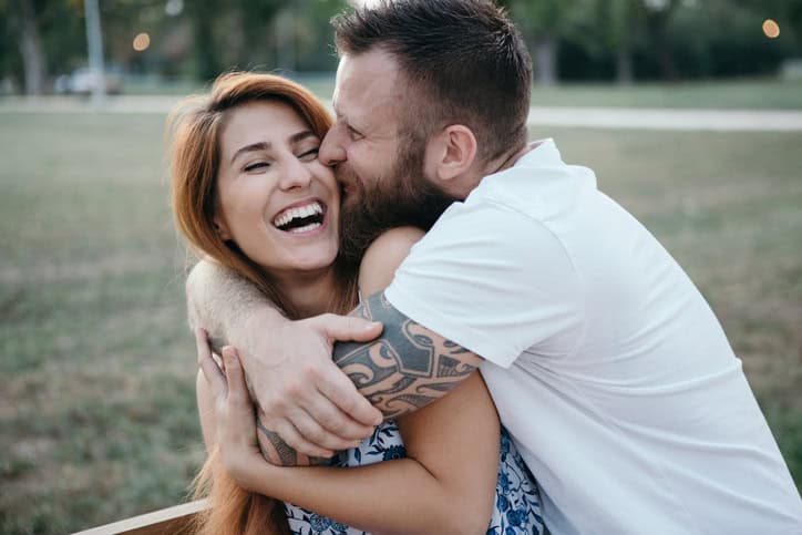 embracing young couple