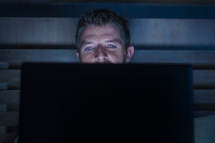 young guy on computer