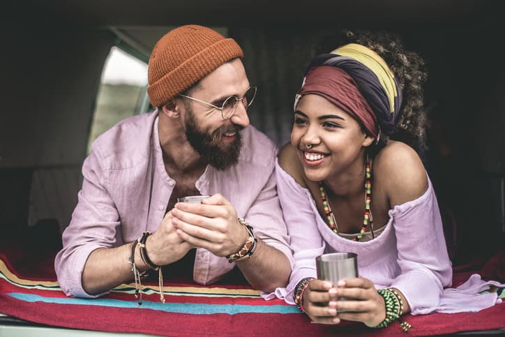 Young couple having a drink together.